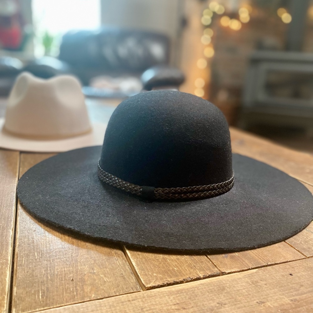 Round crown flat brim hat